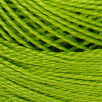 A close-up of bright lime green yarn wound into skeins, showing the twisted fiber texture.
