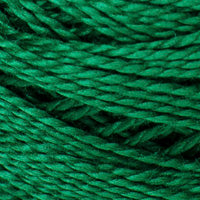 A close-up of bright green braided cord or yarn texture filling the frame.
